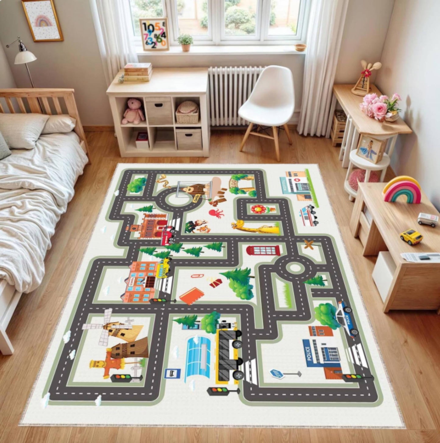 Children's room with a colorful road map rug on the floor.