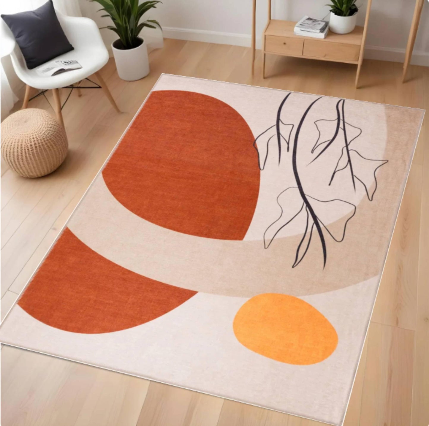 Abstract area rug with orange and beige design on a wooden floor