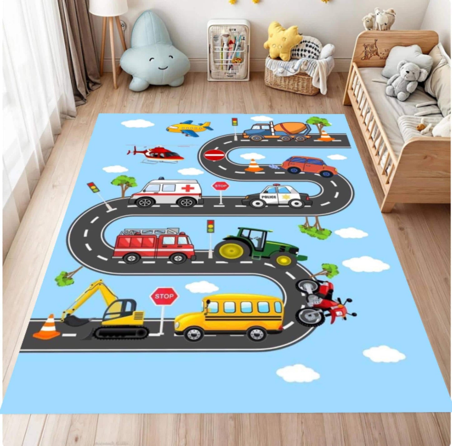 Children's play rug with cartoon vehicles on a wooden floor.