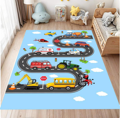 Children's play rug with cartoon vehicles on a wooden floor.