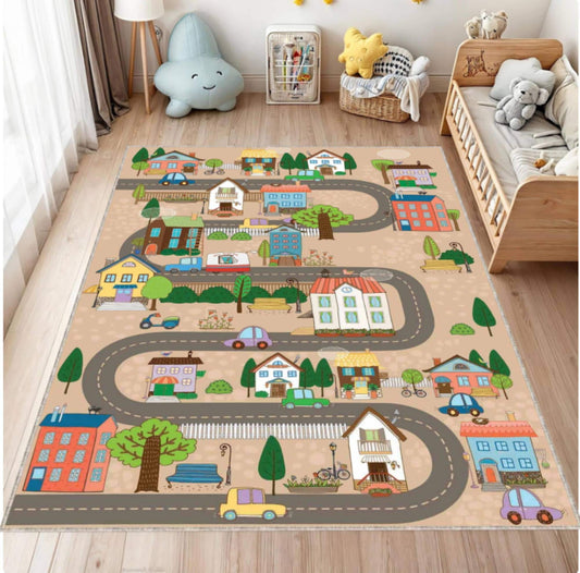 Children's play mat with road and house design in a room with toys and furniture.