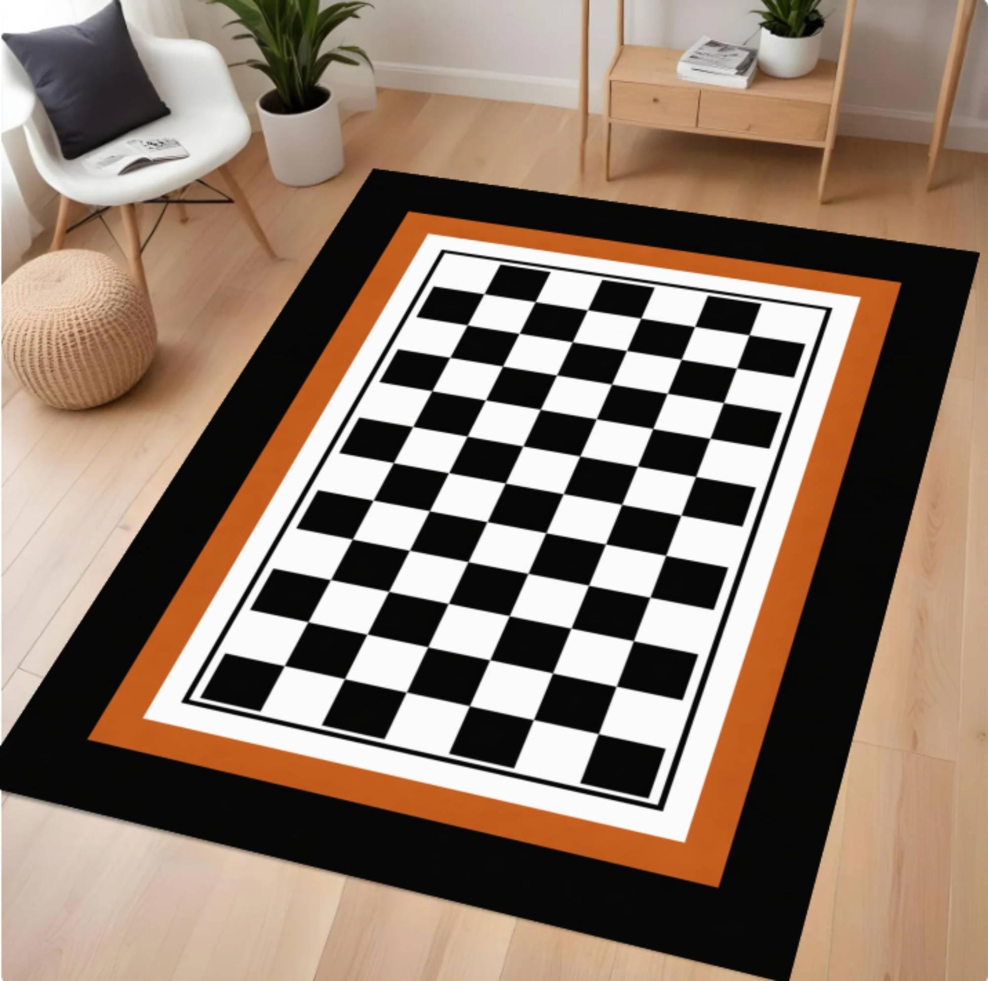 Checkered rug with black, white, and orange pattern on a wooden floor.