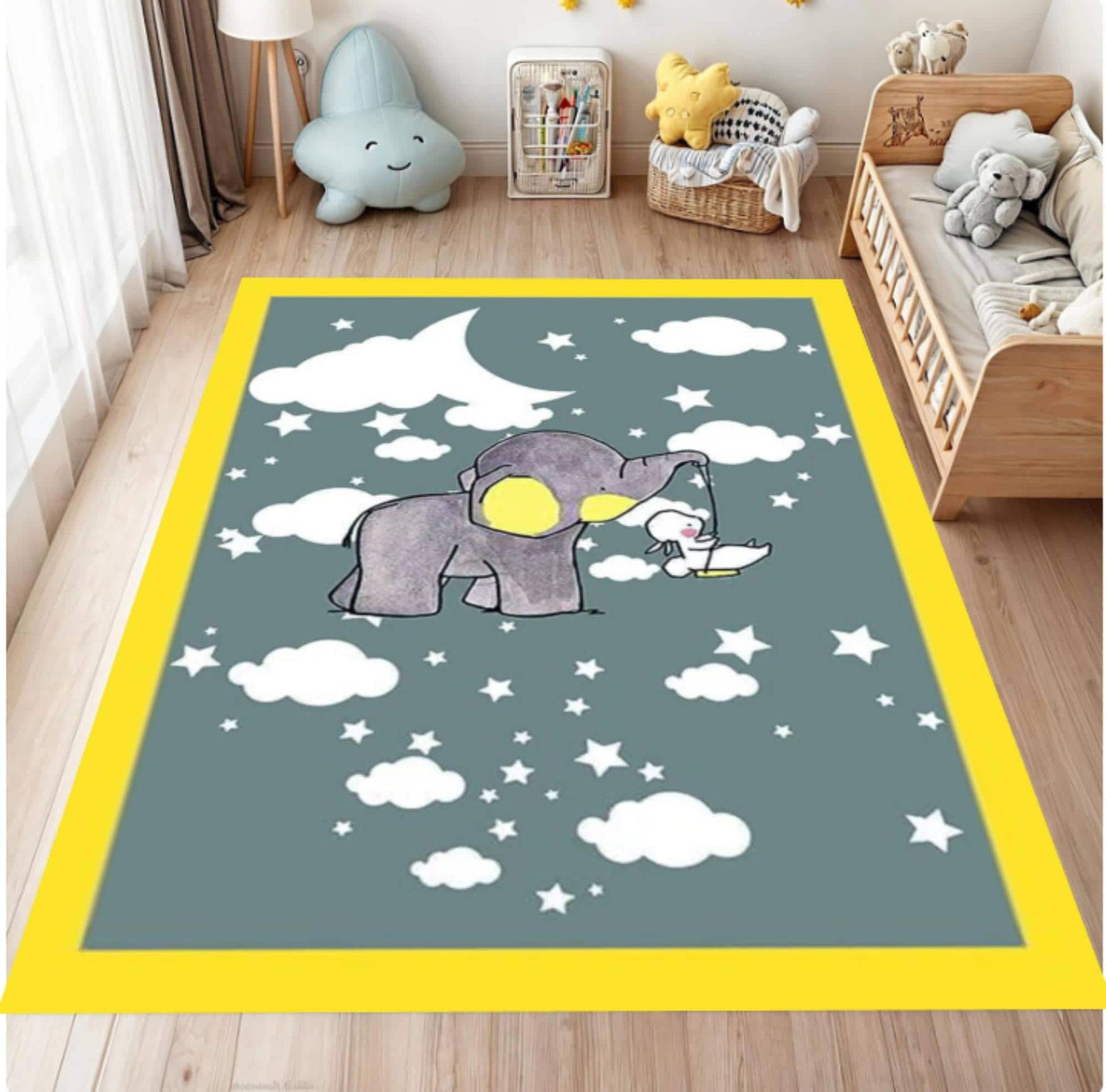 Children's room with a rug featuring an elephant and star design on a wooden floor.