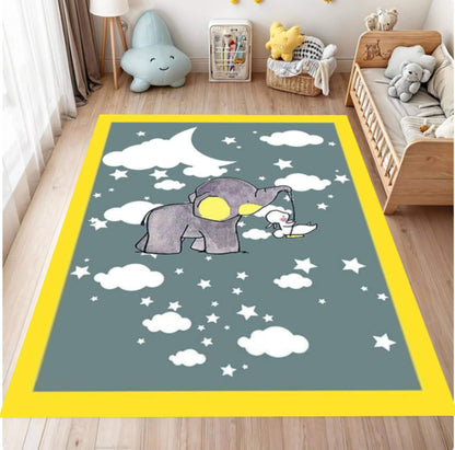 Children's room with a rug featuring an elephant and star design on a wooden floor.