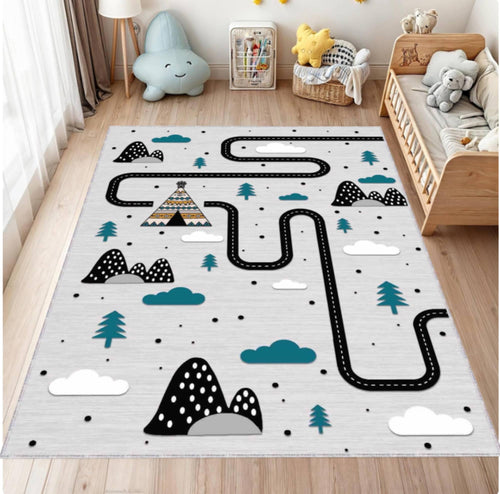 Children's play mat with road design on a wooden floor in a room with toys and furniture.
