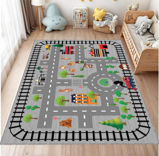 Children's play rug with road and vehicle patterns in a room with toys and furniture.