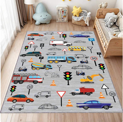 Children's playroom with a colorful rug featuring vehicles and traffic signs.