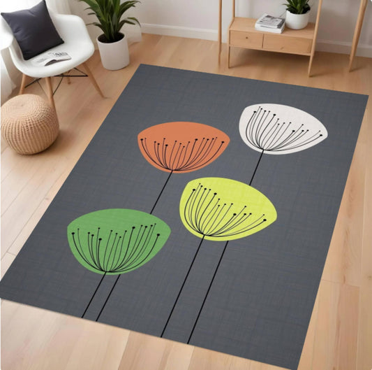 Gray rug with colorful floral design on a wooden floor