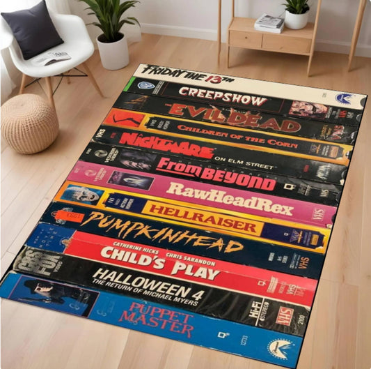 VHS tape design rug with horror movie titles on a wooden floor.