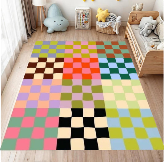 Colorful checkered rug on a wooden floor in a child's room with toys and furniture.