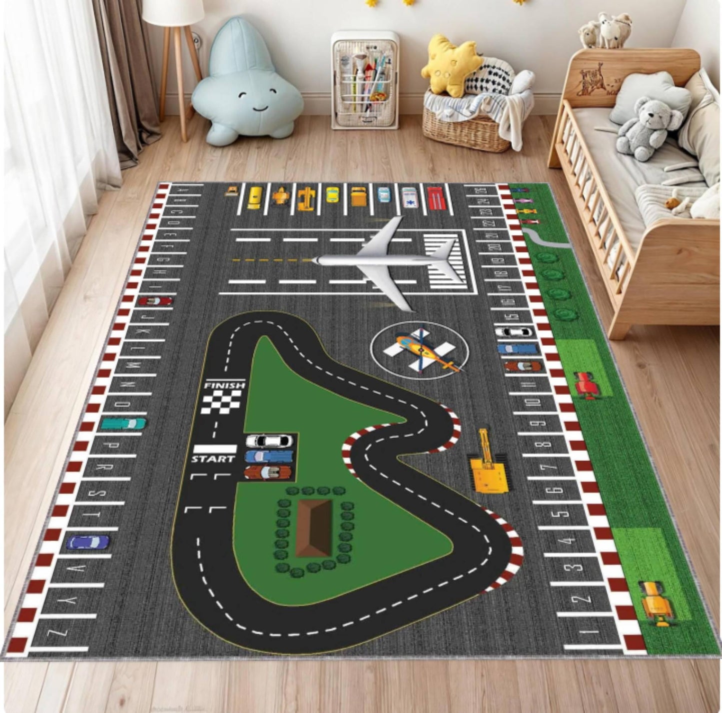 Children's play rug with race track and airport design in a room with toys and furniture.