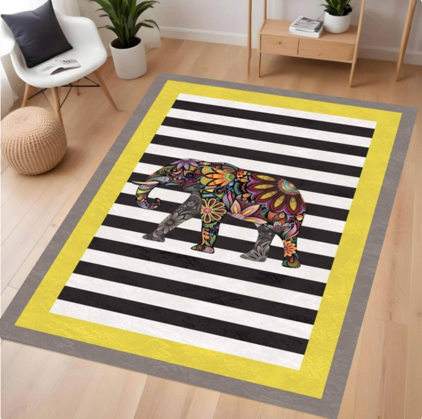 Decorative rug with a colorful elephant design on a black and white striped background, placed in a room with furniture.