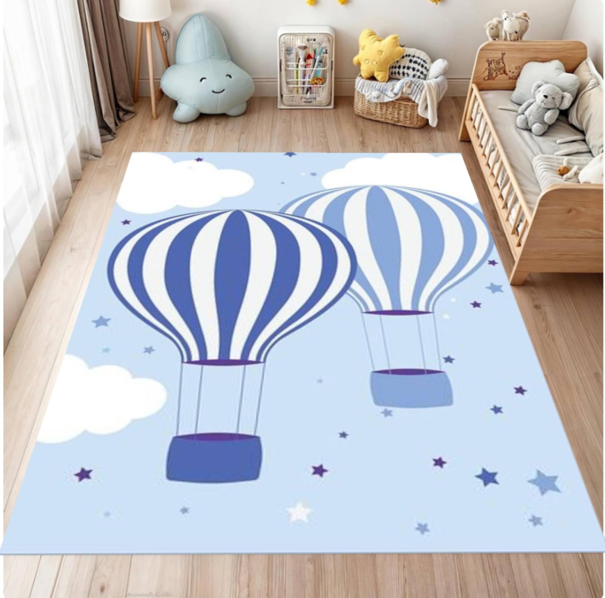 Children's room with a blue rug featuring hot air balloons and stars.