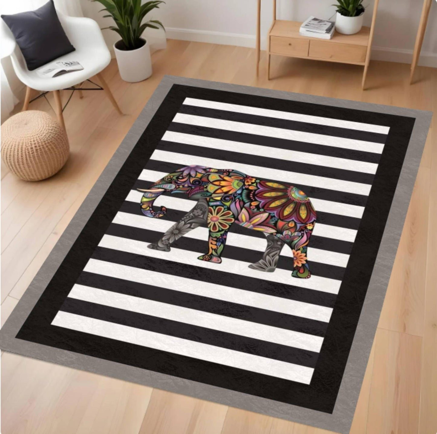 Rug with a colorful rhino design on a black and white striped background in a room.