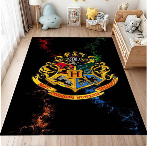 Harry Potter-themed rug with Hogwarts crest on a wooden floor in a child's room.