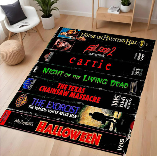 VHS tape design rug with horror movie titles on a wooden floor.