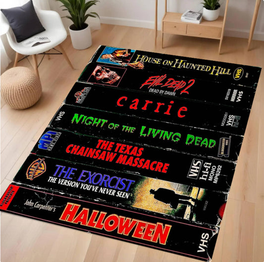 VHS tape design rug with horror movie titles on a wooden floor.