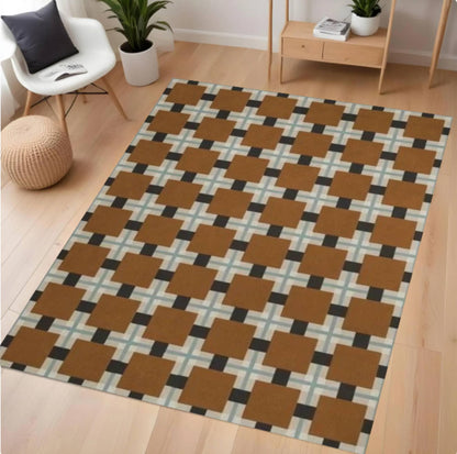 Patterned rug on a wooden floor with furniture in the background