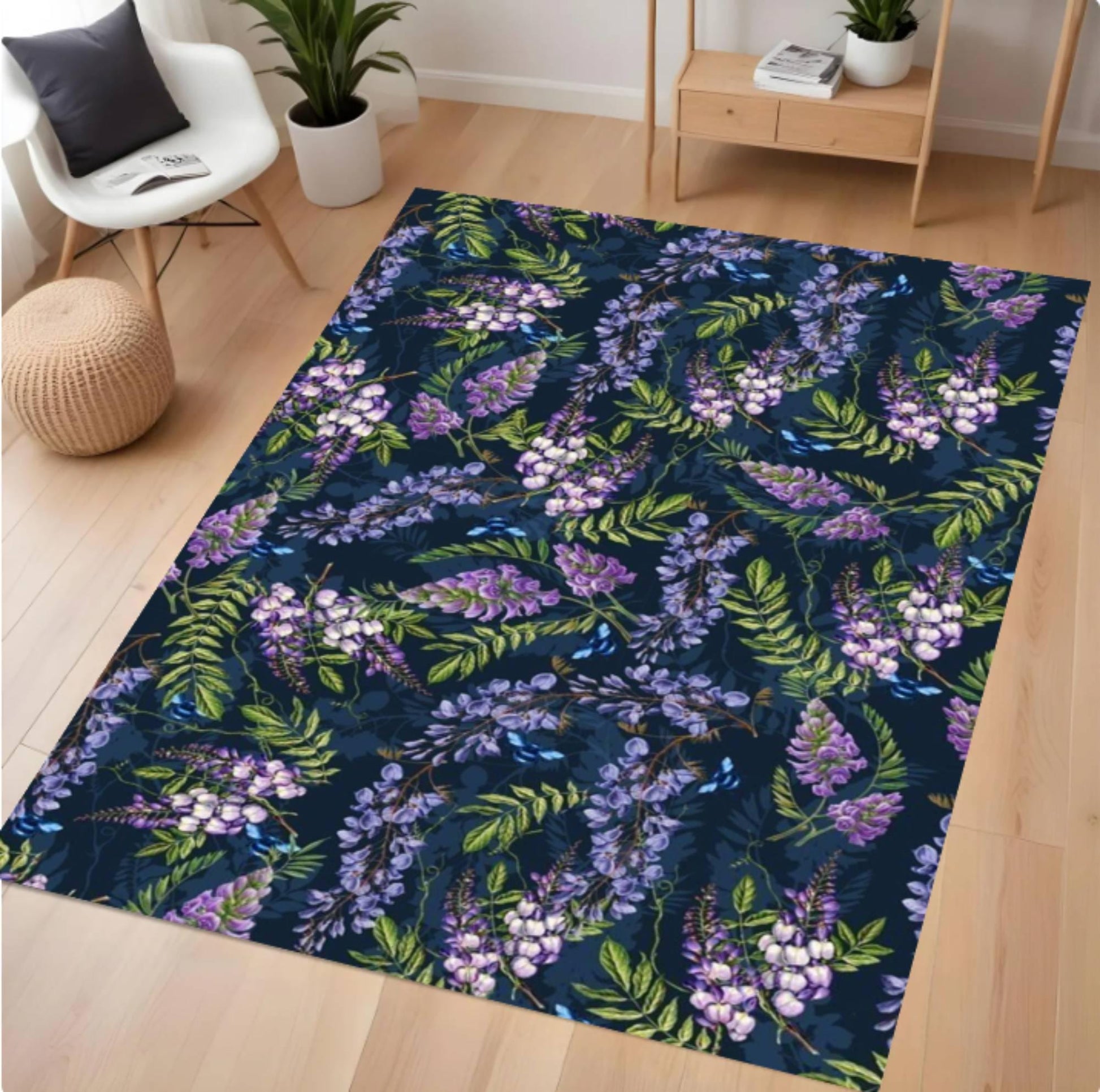 Floral patterned rug on a wooden floor with a chair and plants in the background.