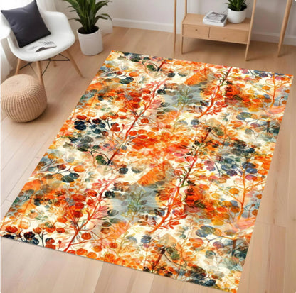 Colorful floral-patterned rug on a wooden floor in a room with furniture.
