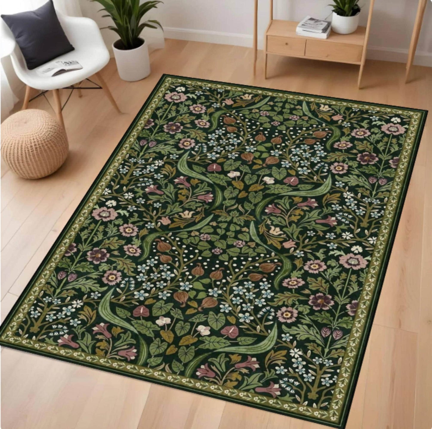 Floral patterned rug on a wooden floor with a chair and plants in the background.