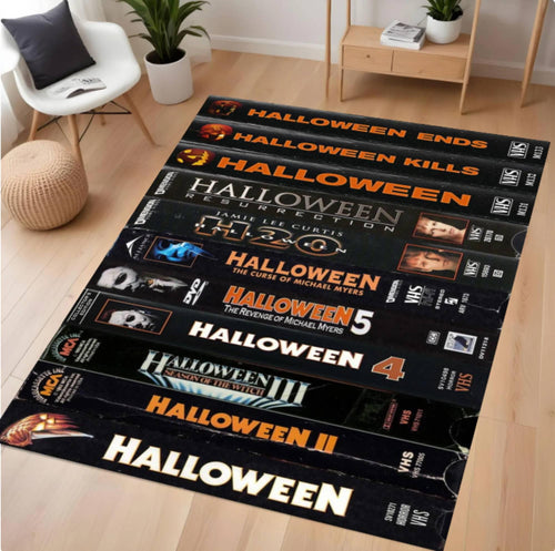 Halloween-themed VHS tape rug displayed in a room with furniture.