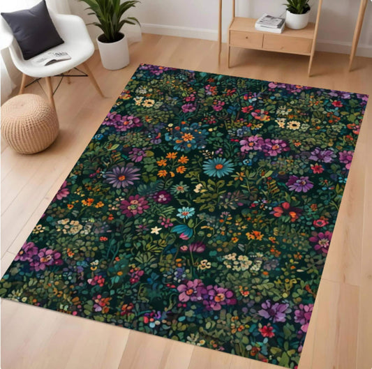 Floral patterned rug on a wooden floor with a chair and plants in the background.