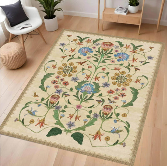 Floral patterned rug on a wooden floor with a chair and plants in the background