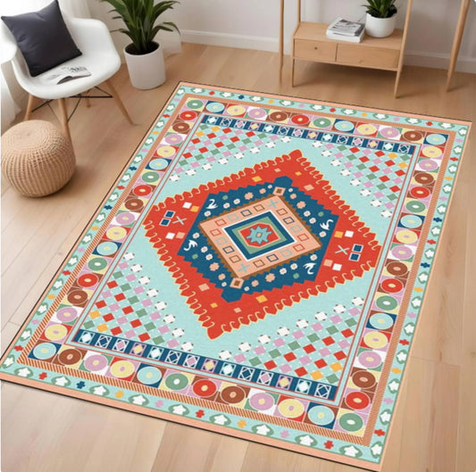 A rectangular area rug with a colorful geometric medallion pattern, shown in a modern living room setting on light wood flooring.