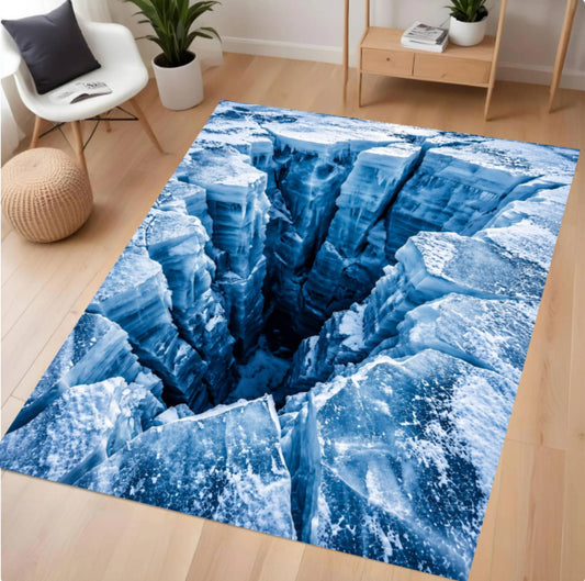 A rectangular area rug with a highly detailed 3D print of a deep blue ice cave or glacier crack, shown on a light wood floor in a modern living room setting.